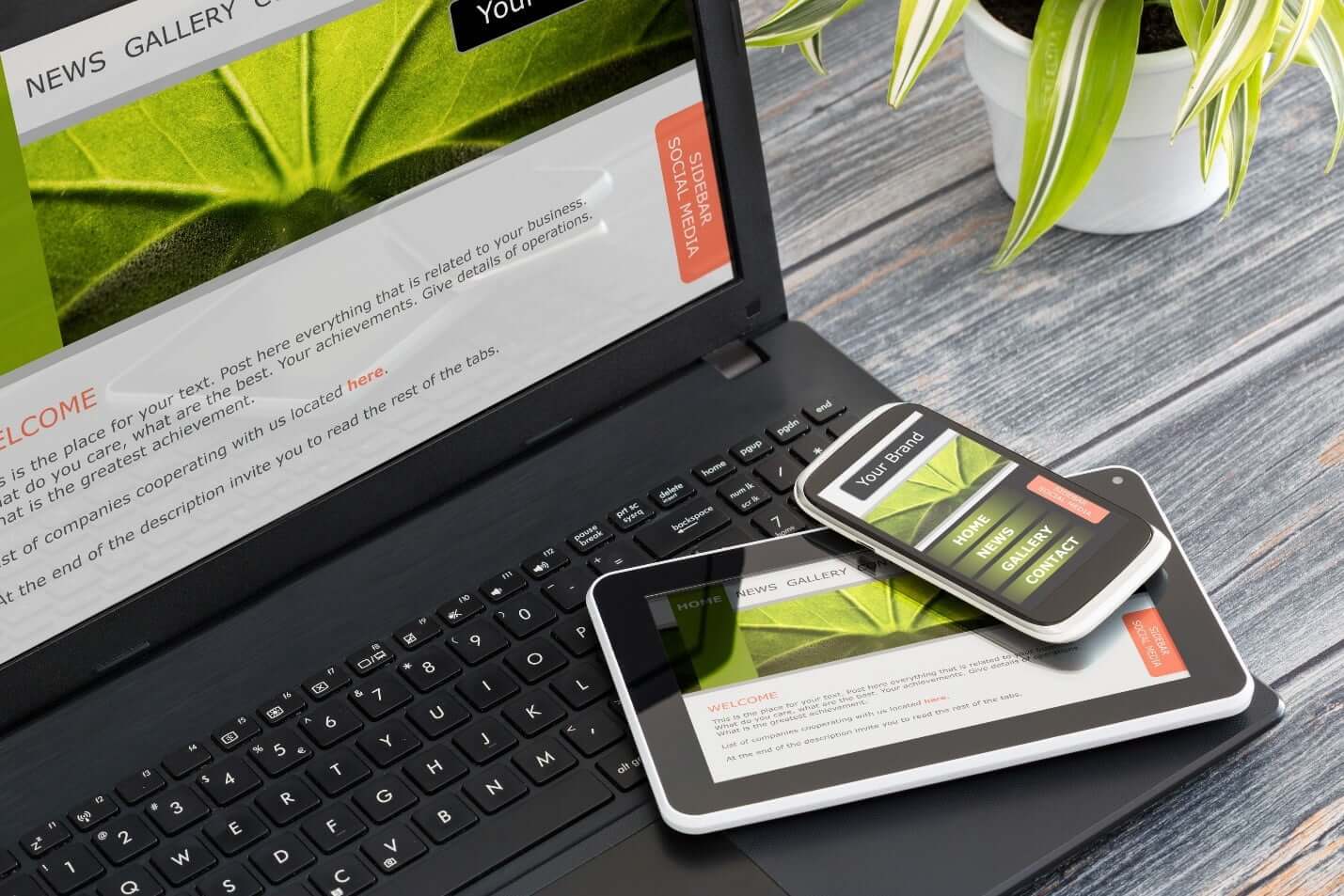 website design displayed on desktop computer, mobile phone, and tablet